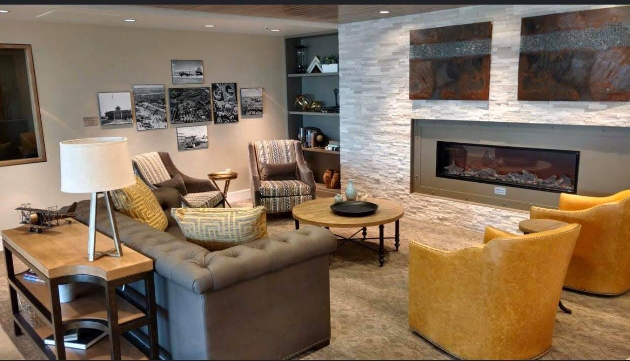 Cozy common area with seating and fireplace