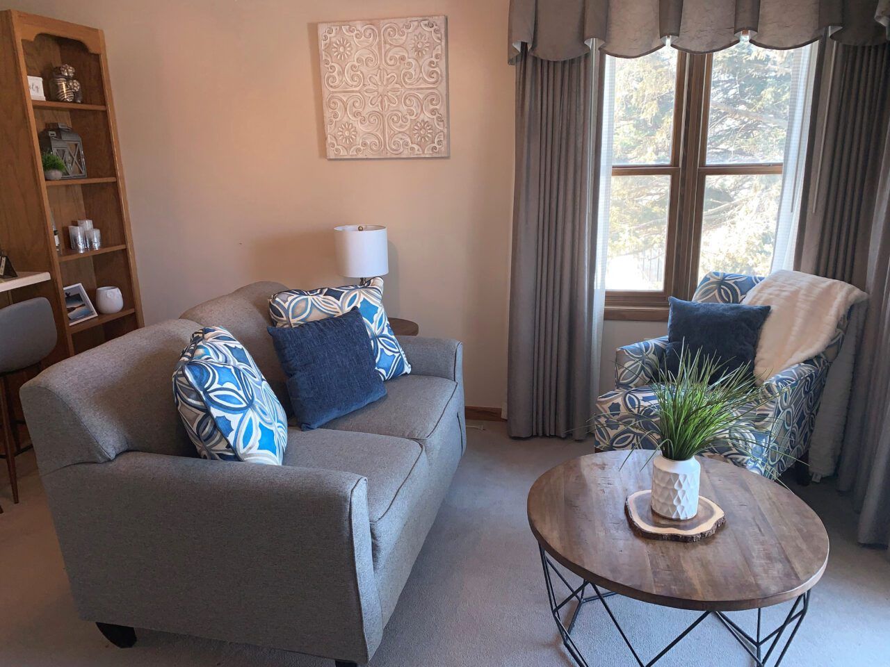 Cozy living room with two chairs and a sofa
