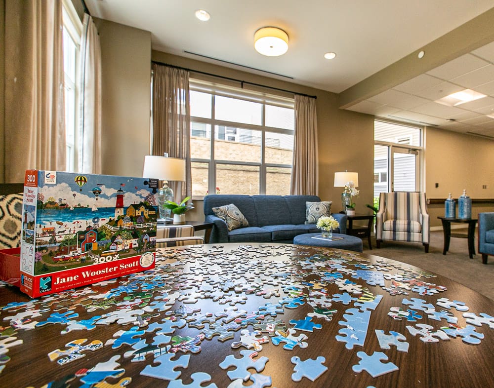 Interior activity room with puzzle on a table