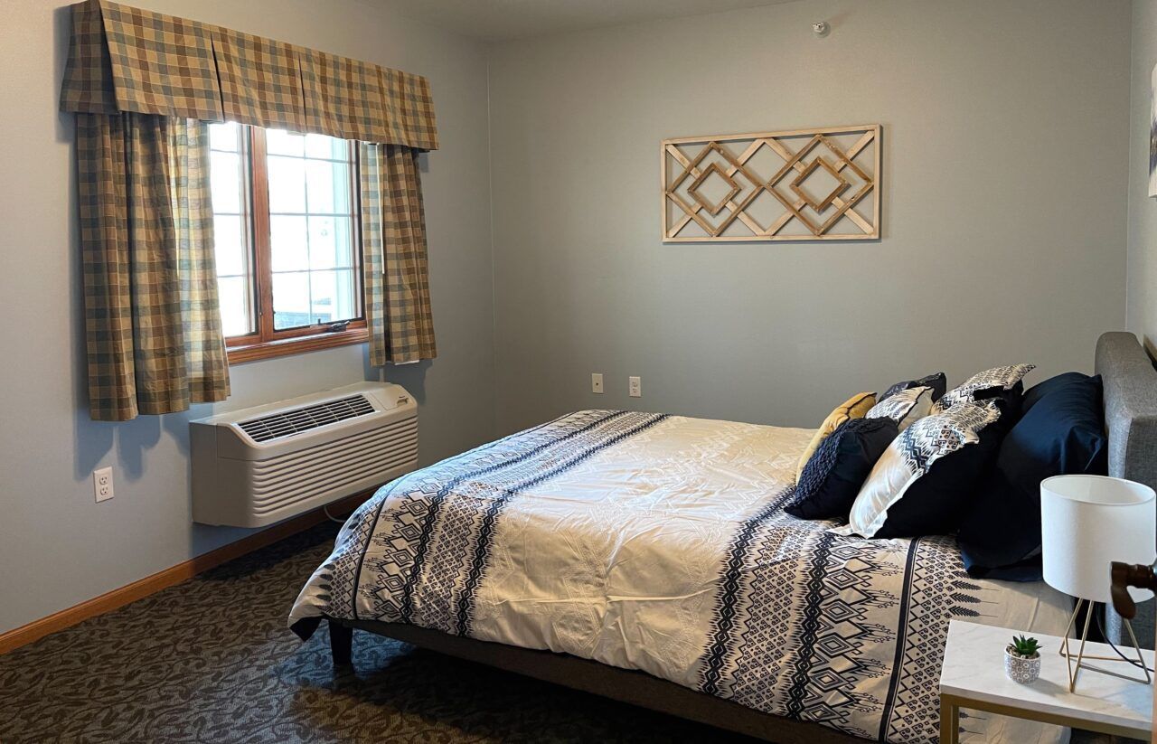 Cozy resident room with a bed and a window