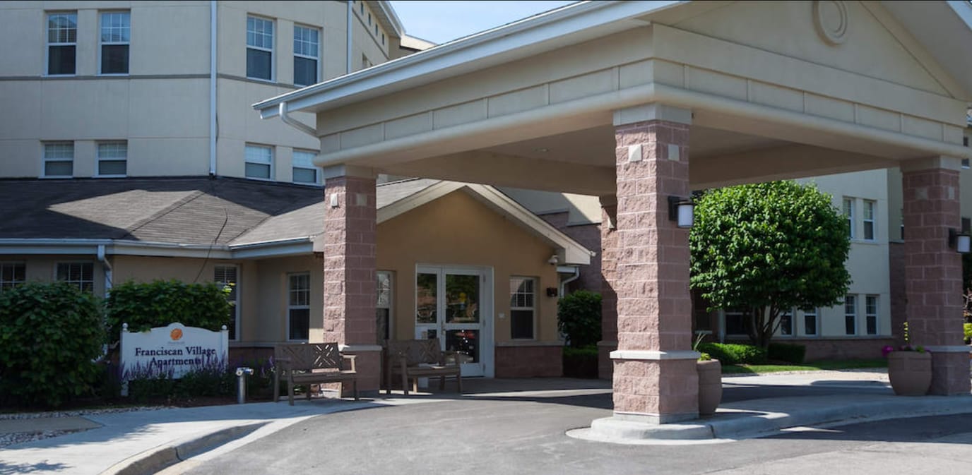 Exterior view of a senior living facility entrance