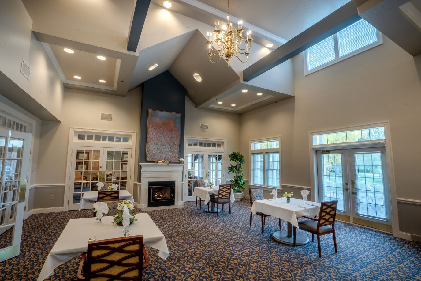 Bright dining area with tables and chairs