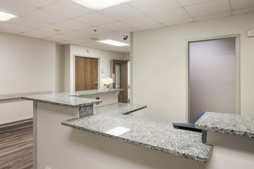 Reception area with a granite counter