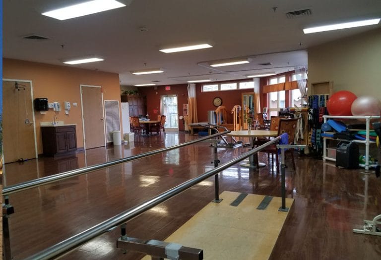 Rehabilitation area with equipment and exercise aids