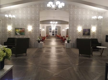 Bright common area with seating and artwork