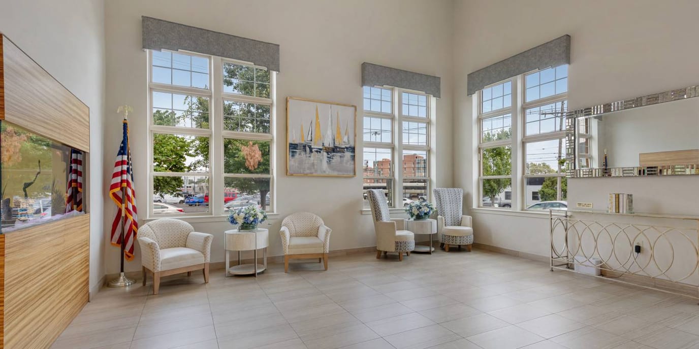 Bright lobby area with seating and large windows