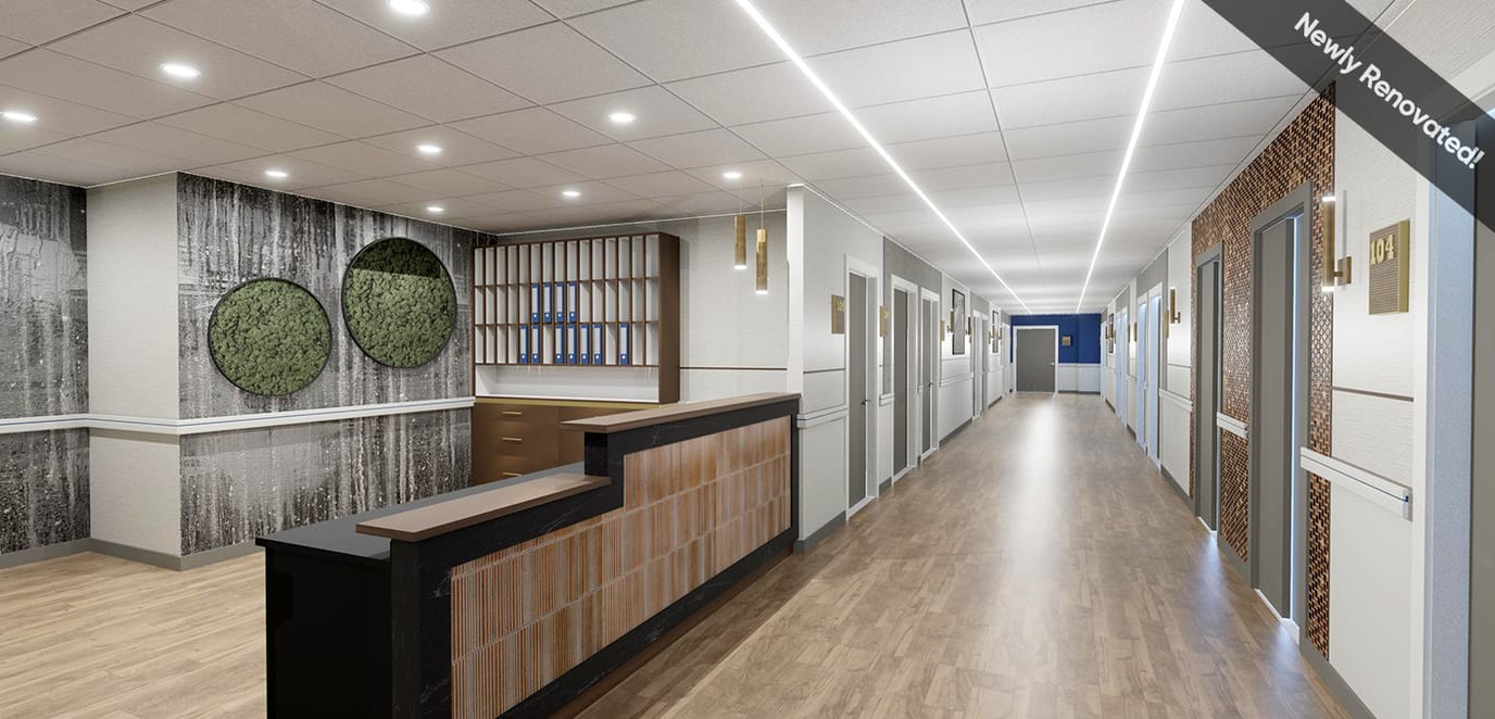 Brightly lit hallway in a newly renovated facility