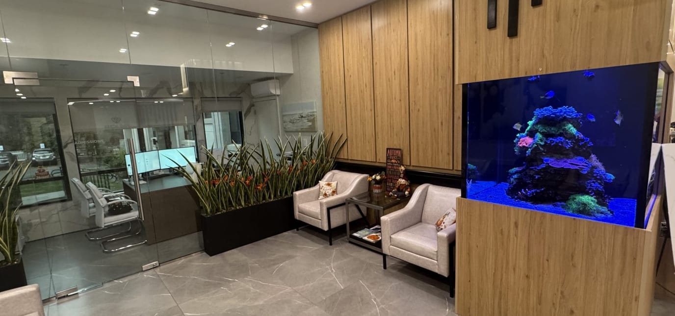 Interior view of a modern lobby with an aquarium