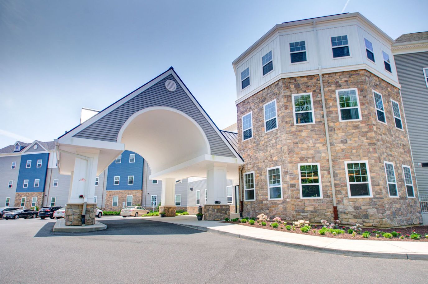 Entrance view of a modern assisted living facility