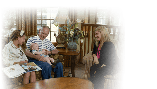 Residents and staff engaged in a warm conversation