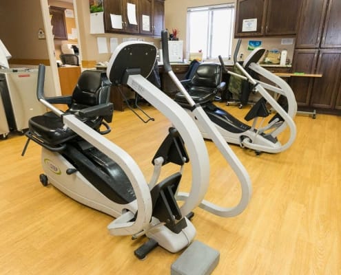 Fitness equipment in a bright exercise room