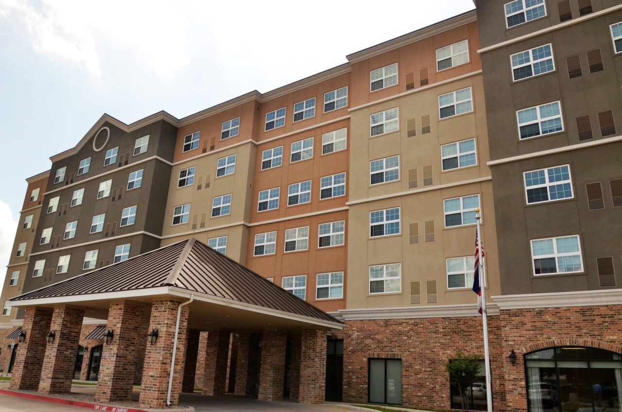 Exterior view of a senior living facility entrance
