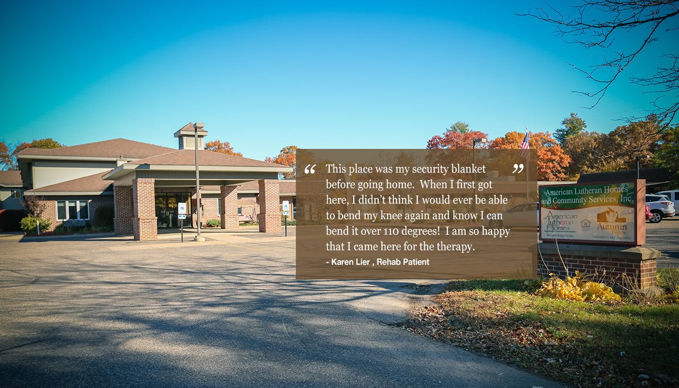 Exterior view of a senior living facility with landscaping