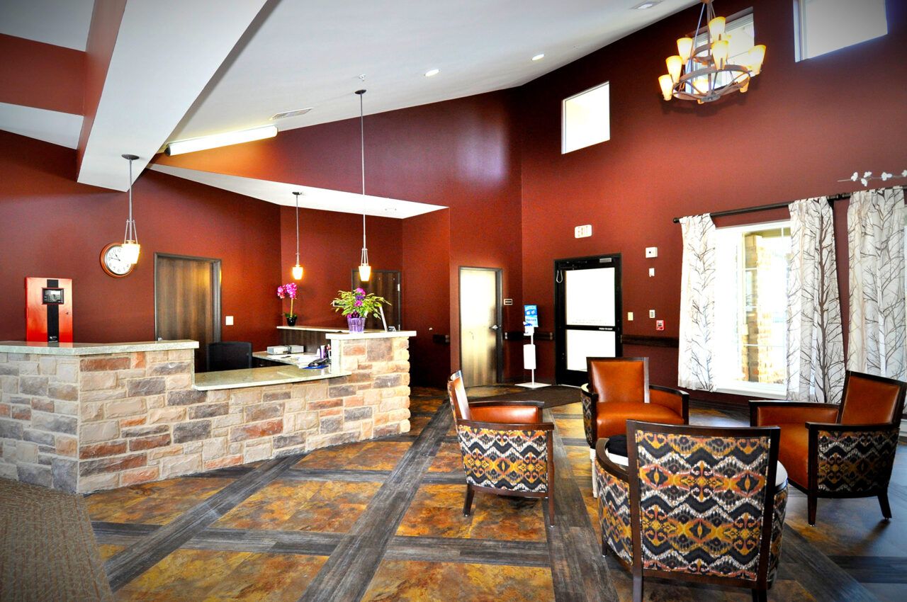 Interior lobby area with seating and reception desk