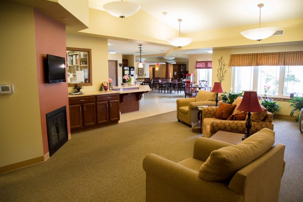 Bright common area with comfortable seating and dining space