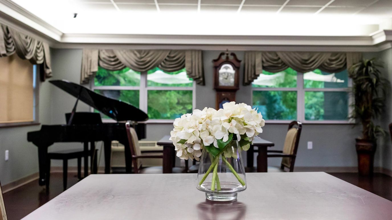 Interior view of a common area with flowers