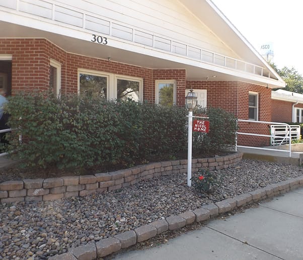Exterior view of an assisted living facility entrance