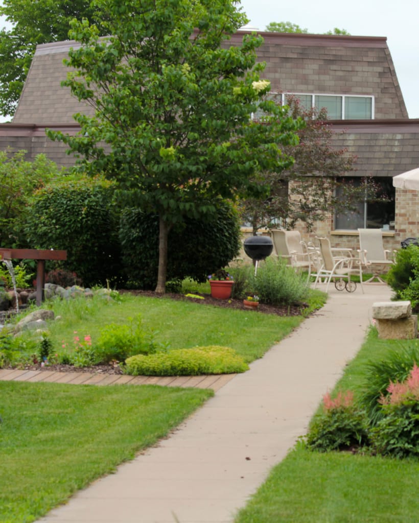 Pathway through a landscaped outdoor garden area