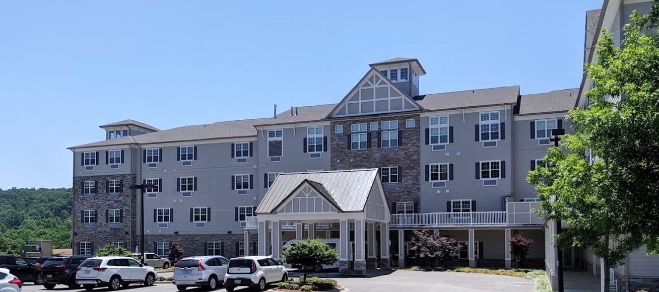 Exterior view of Vantage Pointe Village showing building and landscape