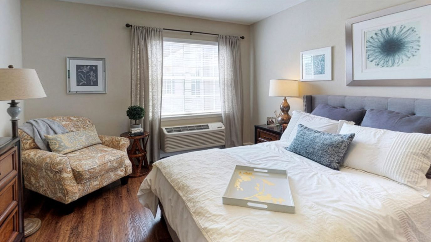 Cozy private resident room with a bed and chair