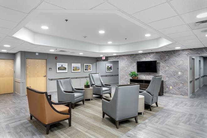 Well-furnished common area with seating and decor