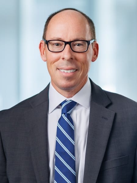 Professional man in glasses wearing a suit