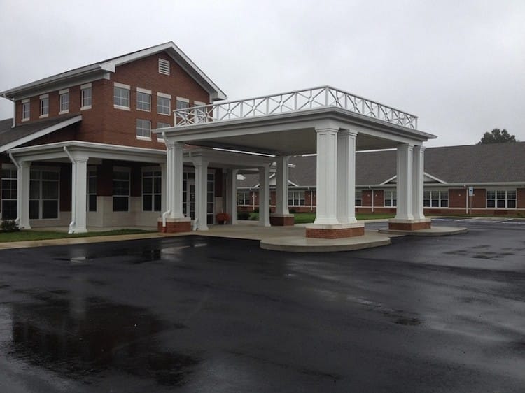 Entrance of a nursing home facility on a rainy day