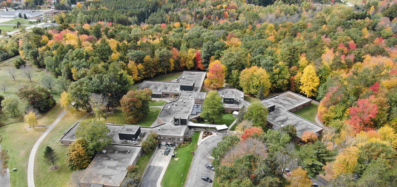 Aerial view of the Rennes Health and Rehab Center surrounded by colorful trees