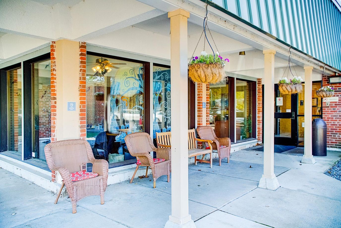 Outdoor seating area at the facility entrance