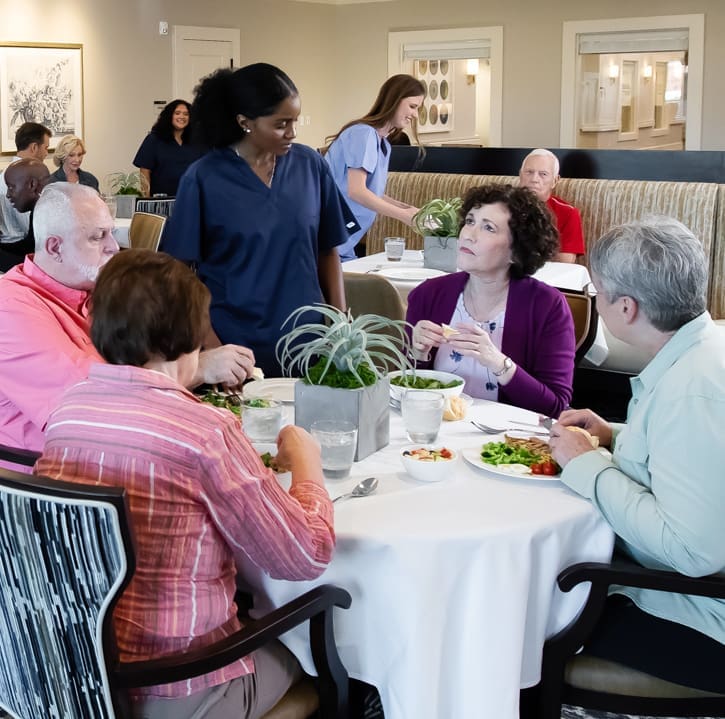 Residents enjoying lunch together in the dining area