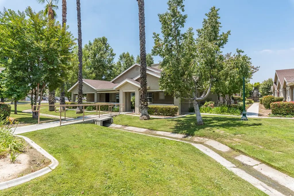 Exterior view of the Cottages at Hemet with landscaping