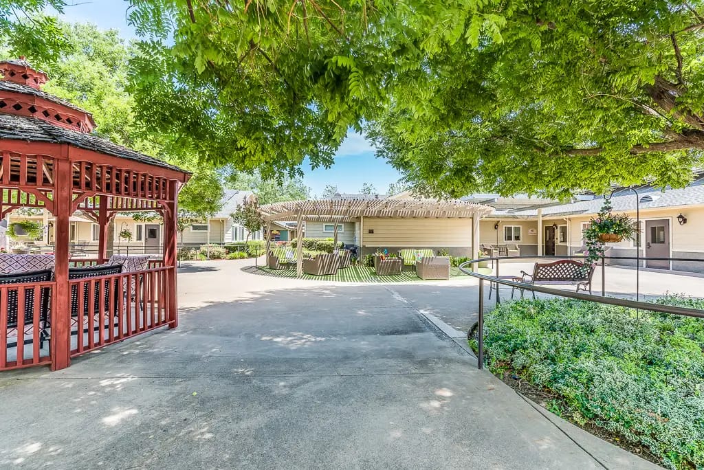 Outdoor courtyard with gazebo and shaded seating areas