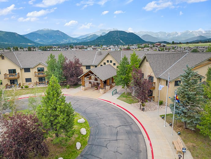 Aerial view of the assisted living facility surrounded by mountains