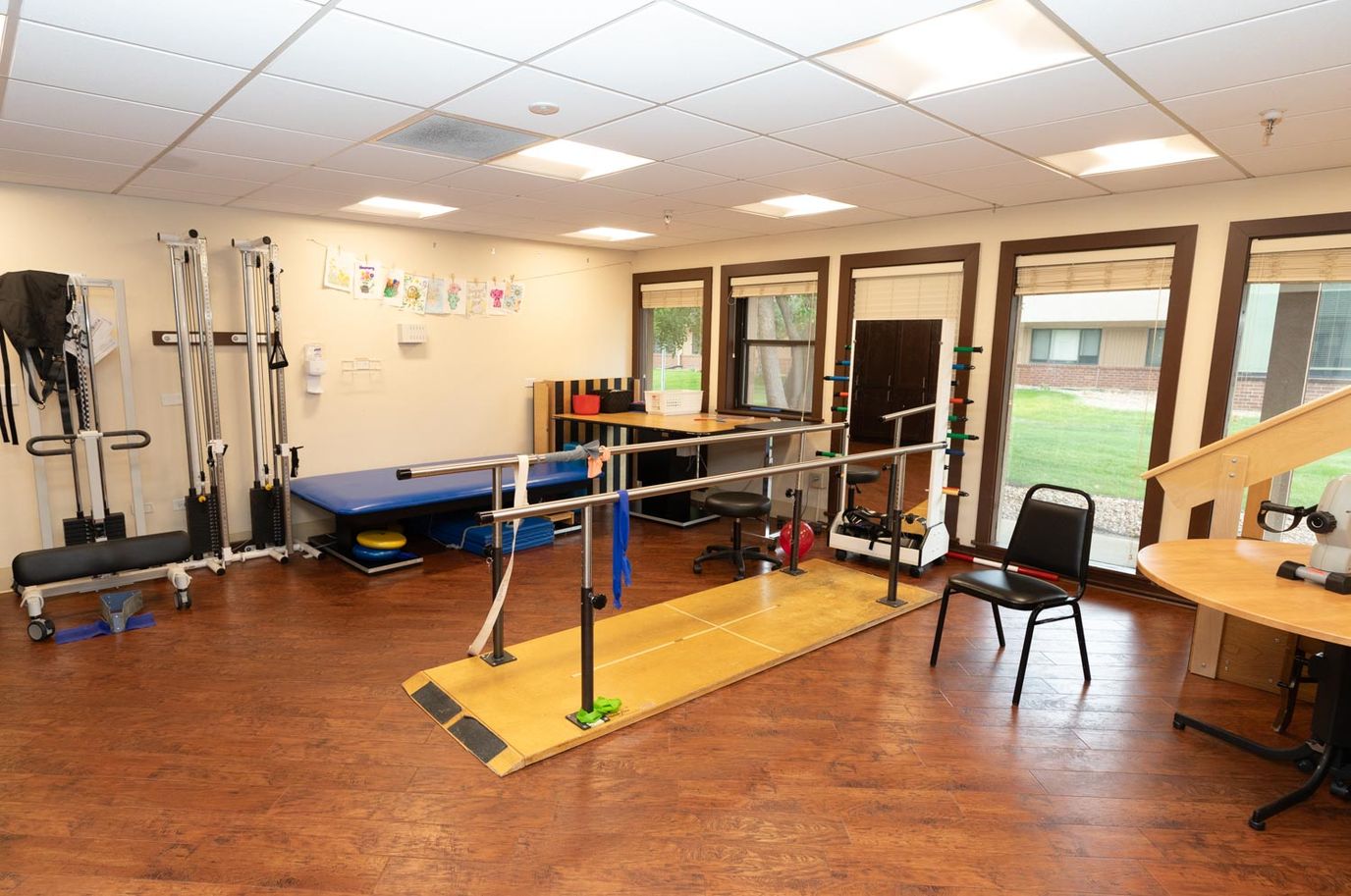 Physical therapy room with equipment and space