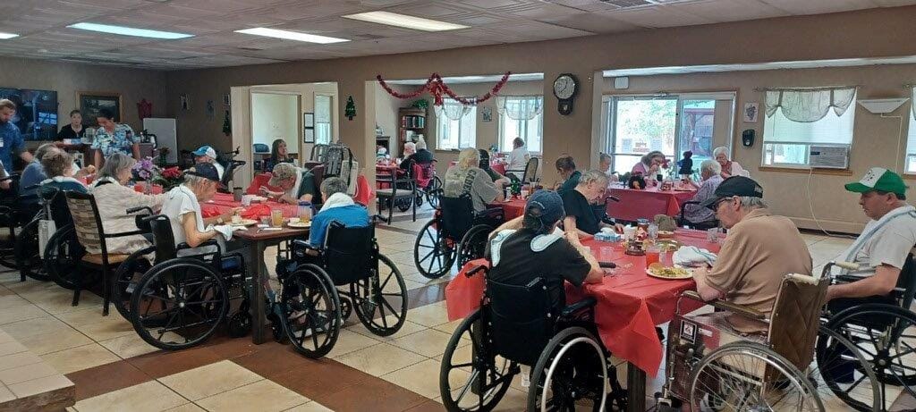 Residents enjoying a meal in the dining room