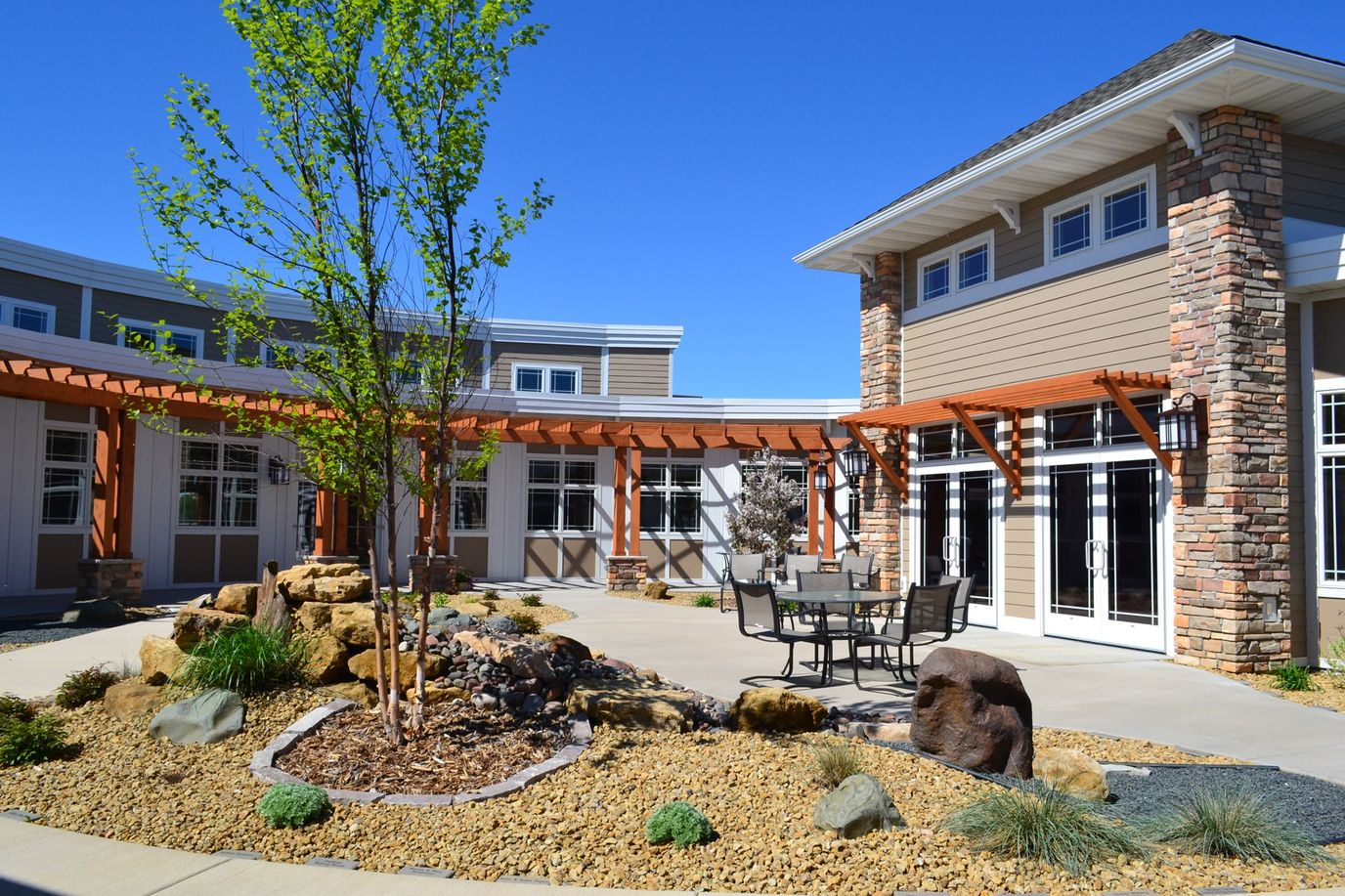 Exterior view of the facility with landscaping