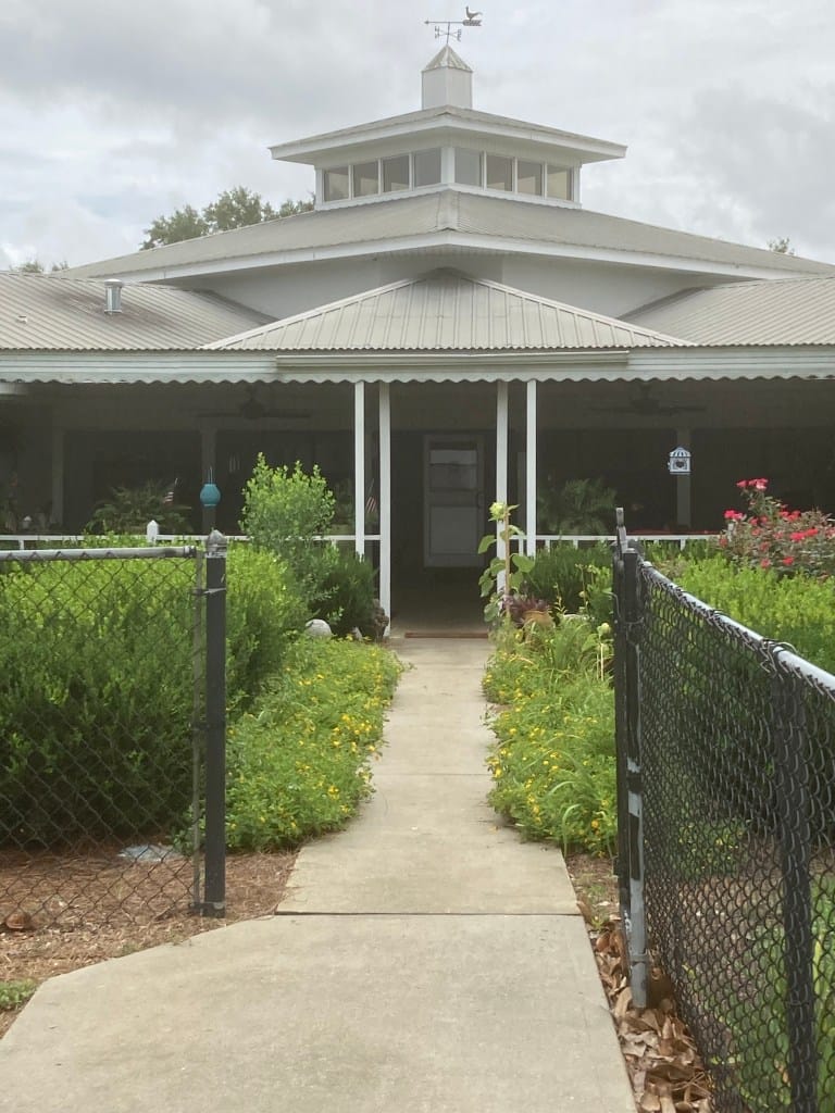Front entrance of the Hartford Retirement Village with greenery
