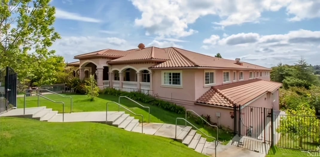 Exterior view of Bayview Villa with landscaped grounds