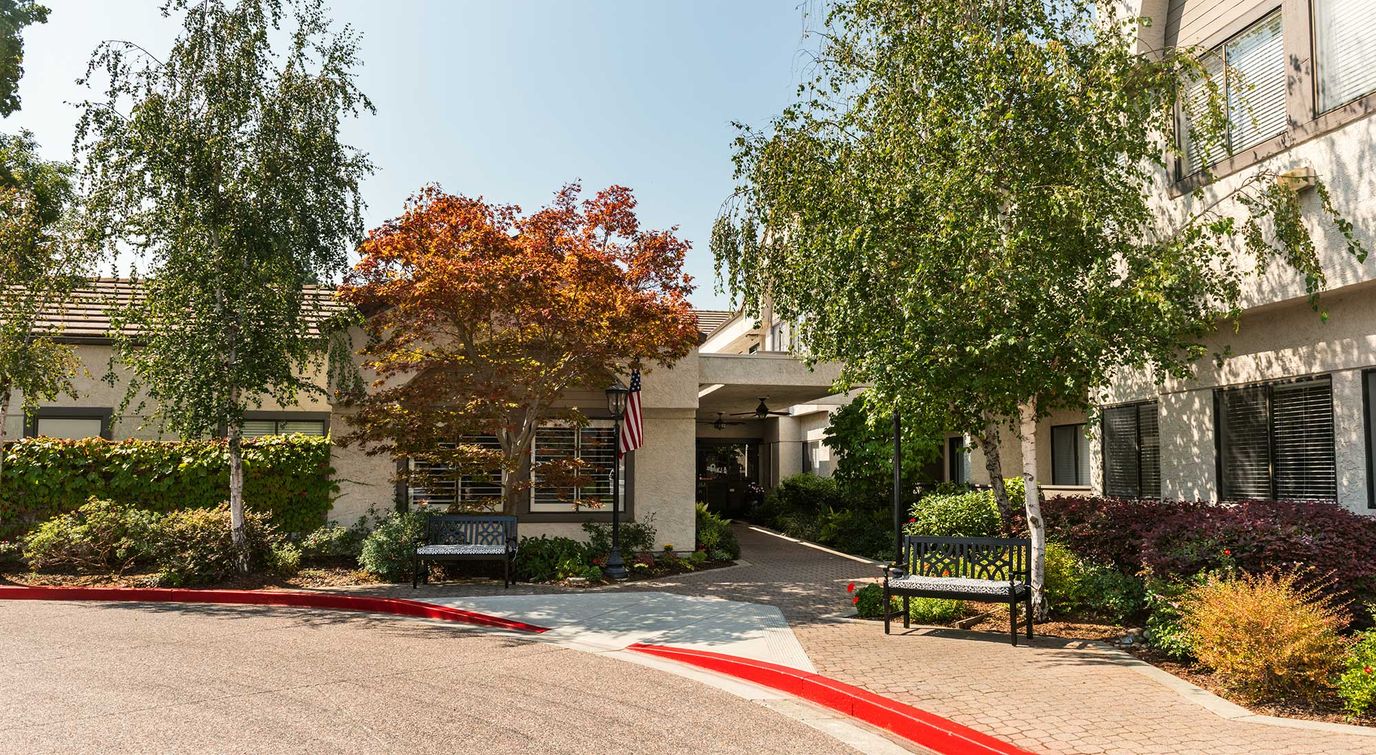 Exterior view of Moraga Royale with landscaping