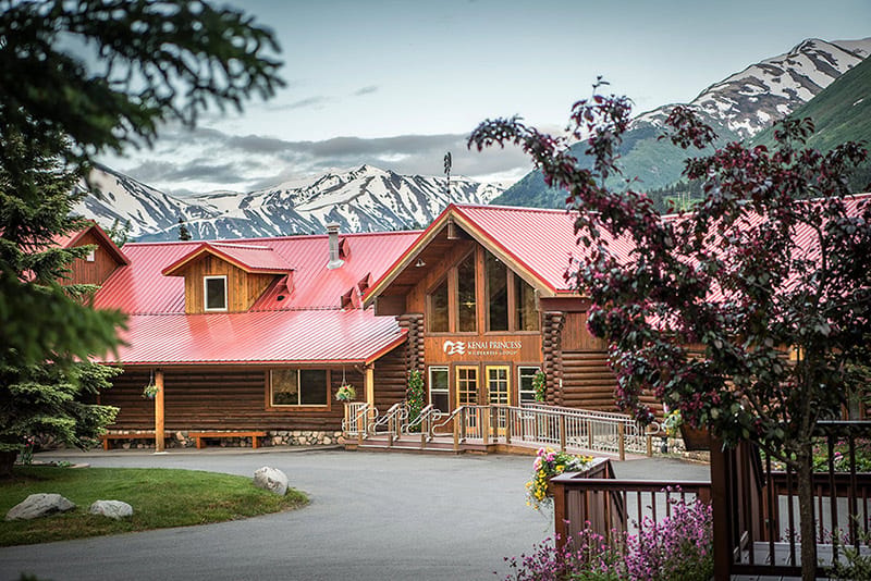 Exterior view of Princess Lodge surrounded by mountains