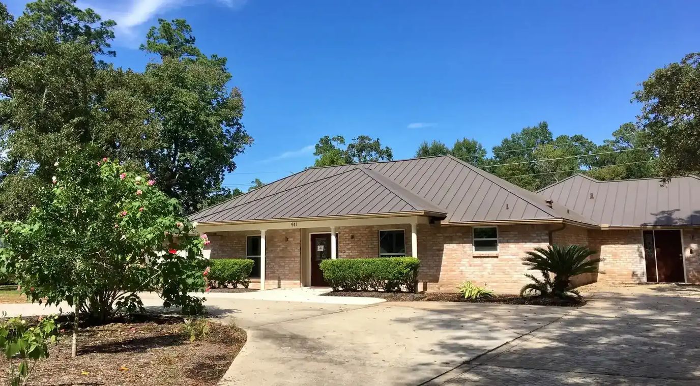 Exterior view of a building in a landscaped area