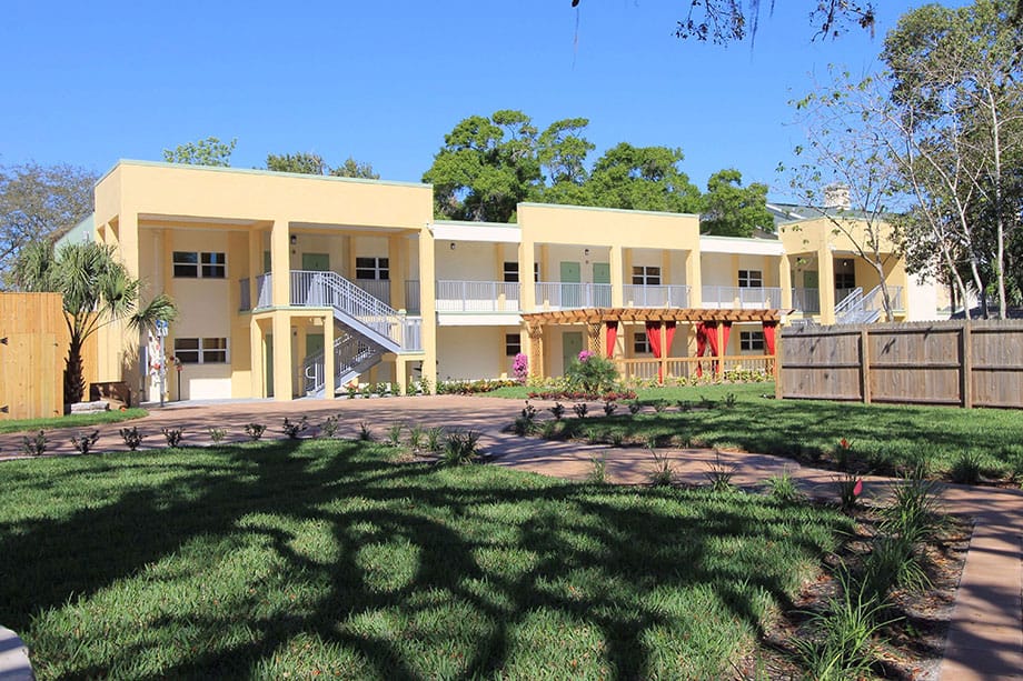 Best Care Senior Living at Heritage Manor, assisted living in Tampa, FL — Senior living facility with landscaped grounds and residential buildings