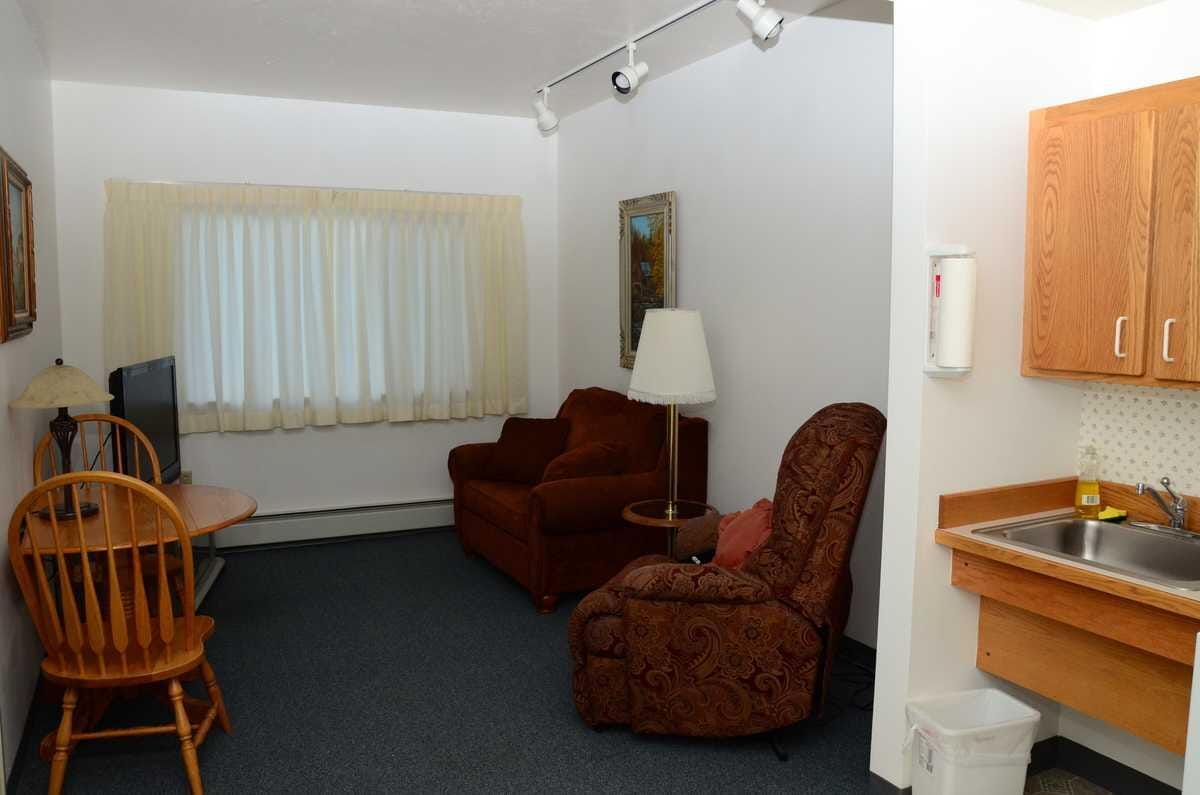 Cozy private resident room with seating area