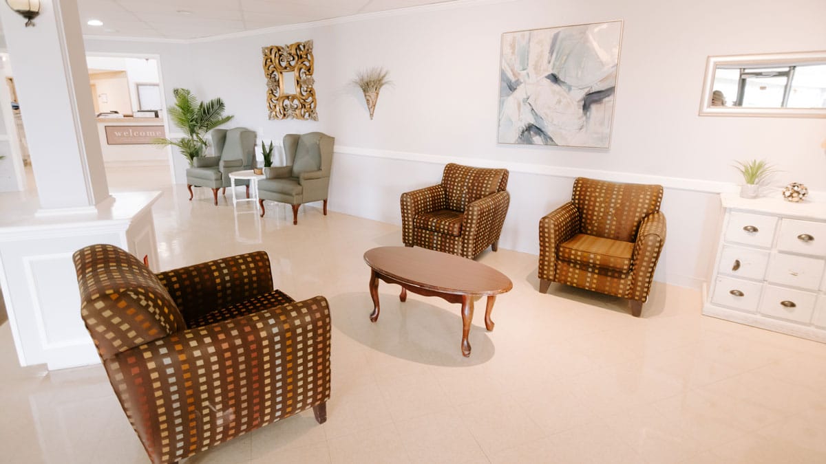 Seating area with patterned chairs and a coffee table