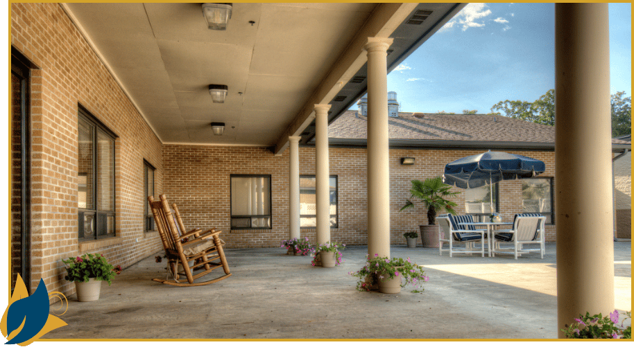 Outdoor seating area with a rocking chair and patio furniture