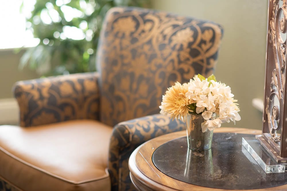 Cozy interior corner with floral arrangement