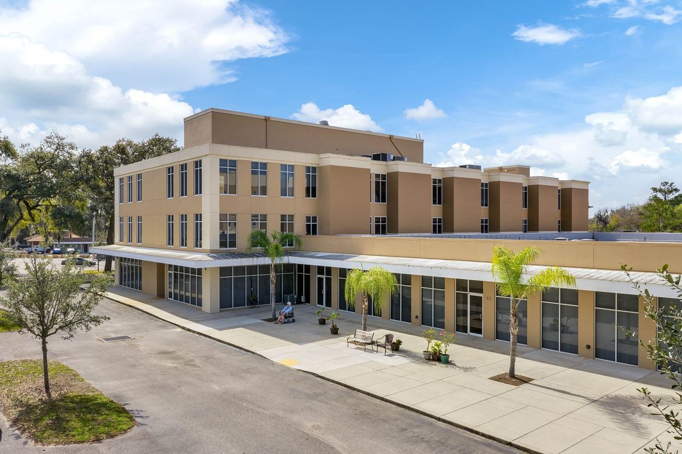 Exterior view of The Grande Senior Living facility