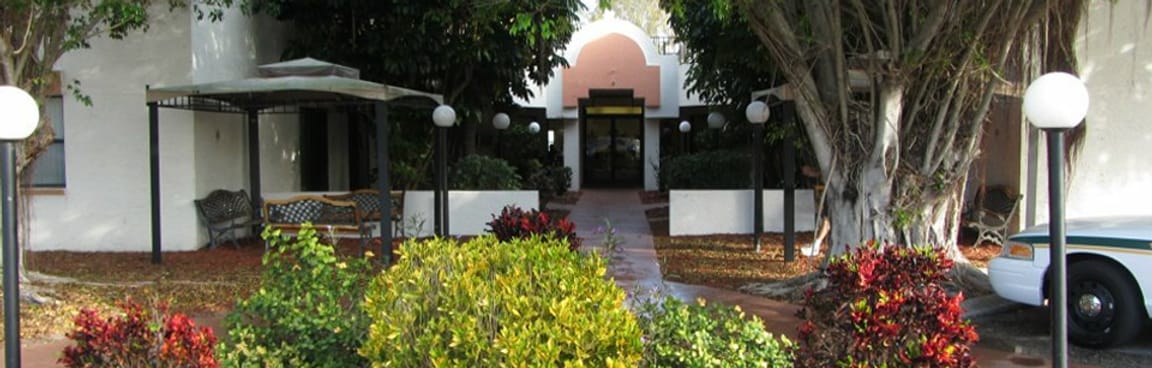 Entrance area of Vick Street Manor with landscaping