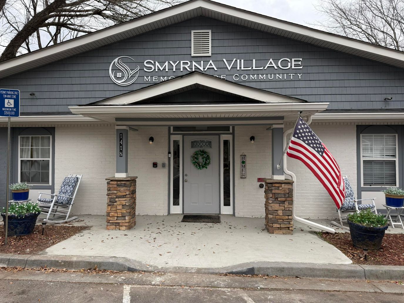 Exterior view of Smyrna Village with American flag