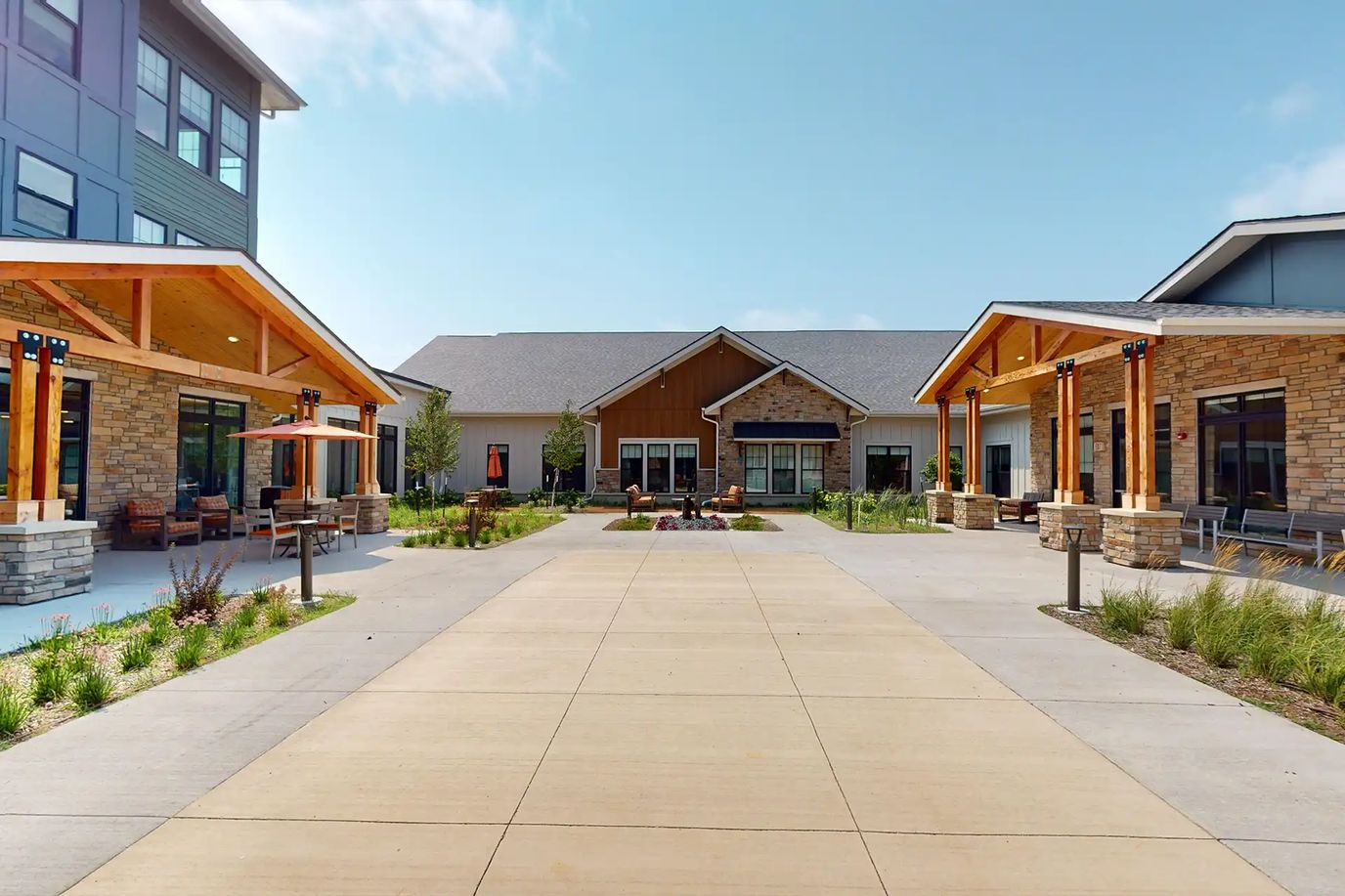 Exterior view of Copperwood at Prairie Trail with garden area
